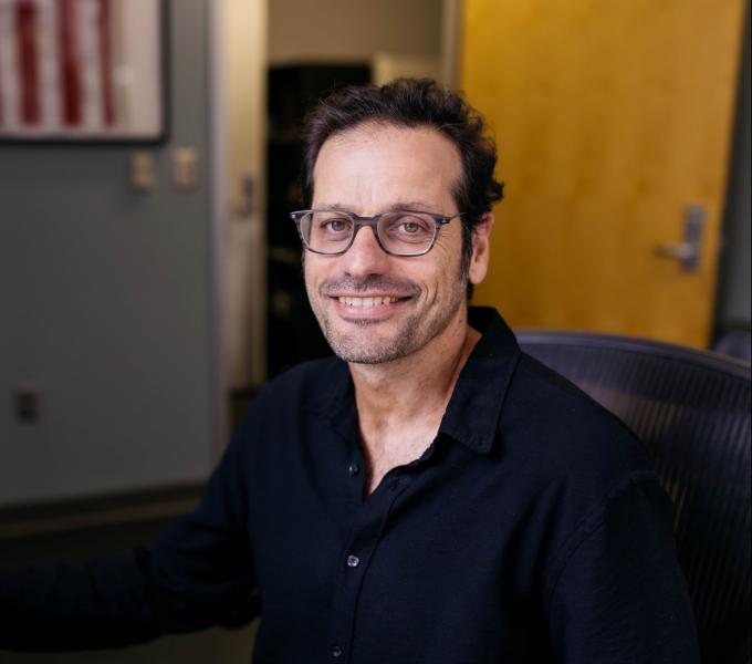 Dr. Tzounopoulos smiling directly at camera